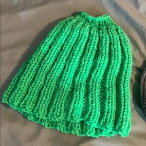 Green hat that you can put a messy bun through